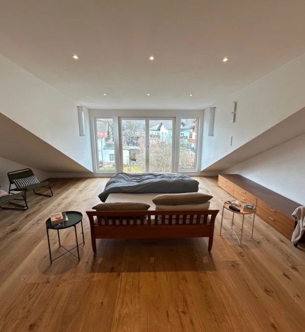baumangement-hp-immobilienmanagement-hanspeter-rass-dachboden-schlafzimmer-neu-nachher